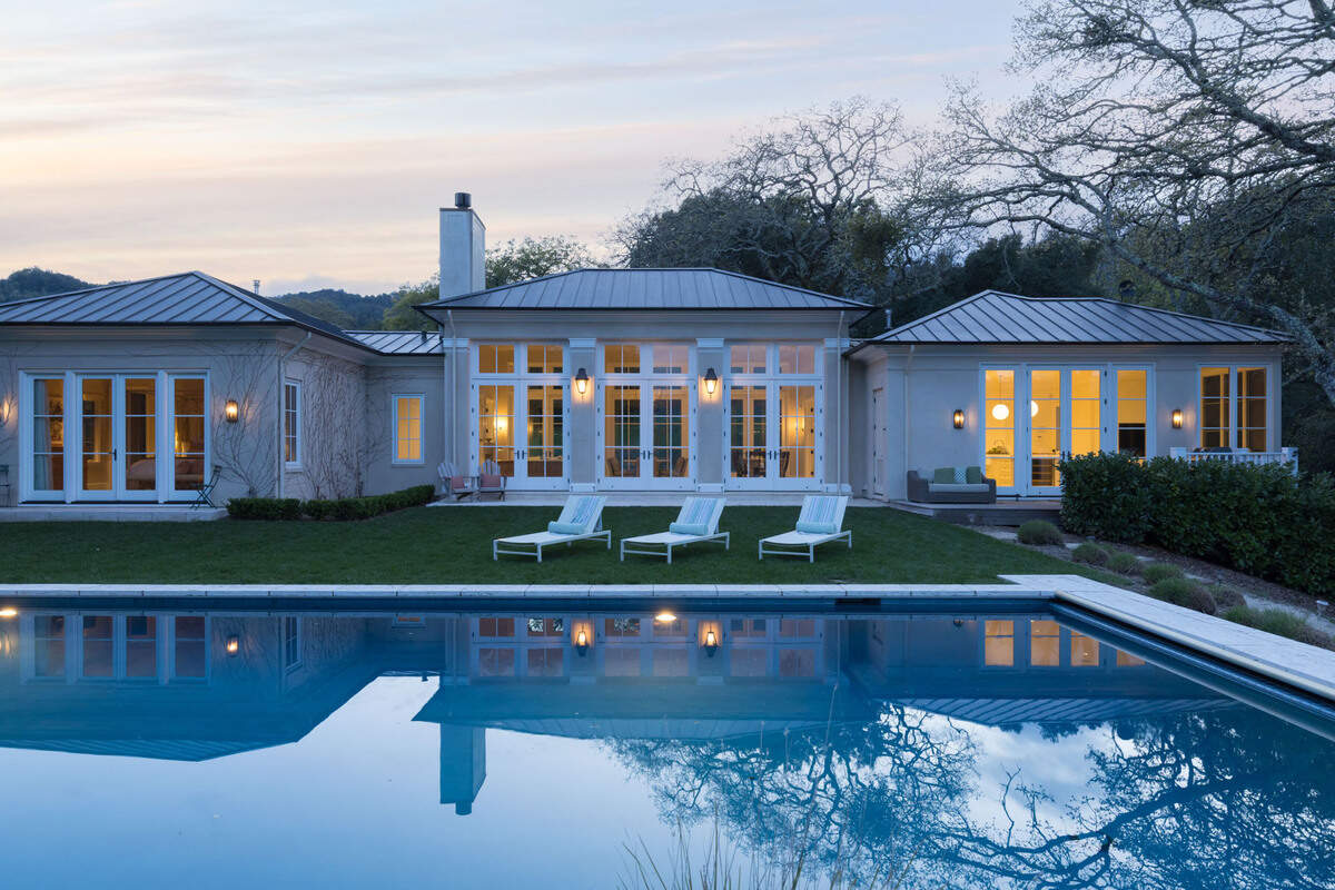 The home in Sonoma, California, for sale for $4.95 million has an expansive lawn adjacent to the pool.