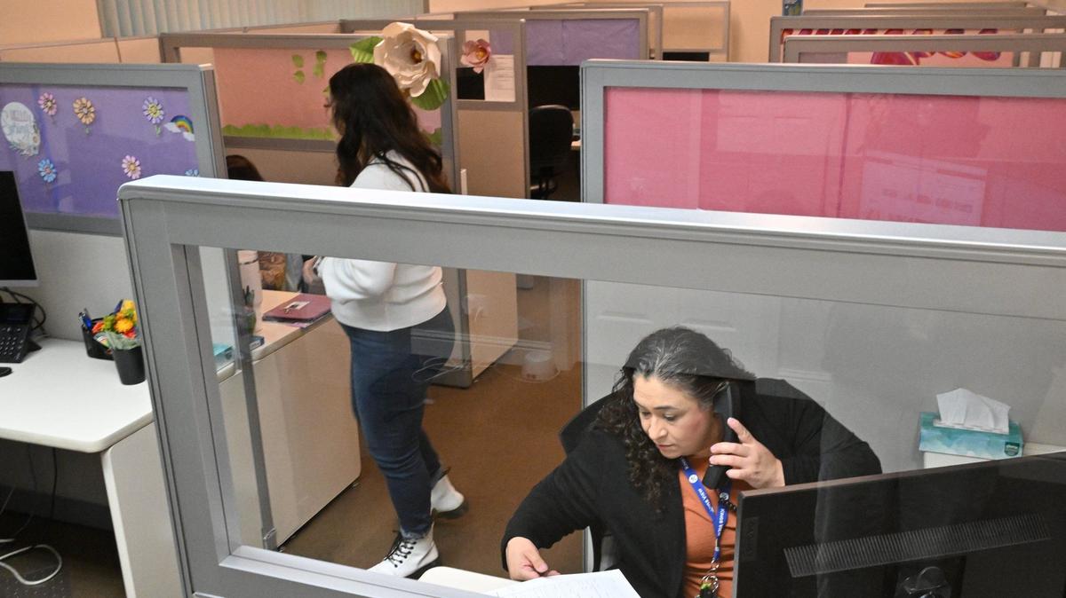 Suicide Prevention Specialist Luz Lopez, bottom right, answers a call at the 988 Suicide & Crises Lifeline call center April 26, 2024 in Fresno.