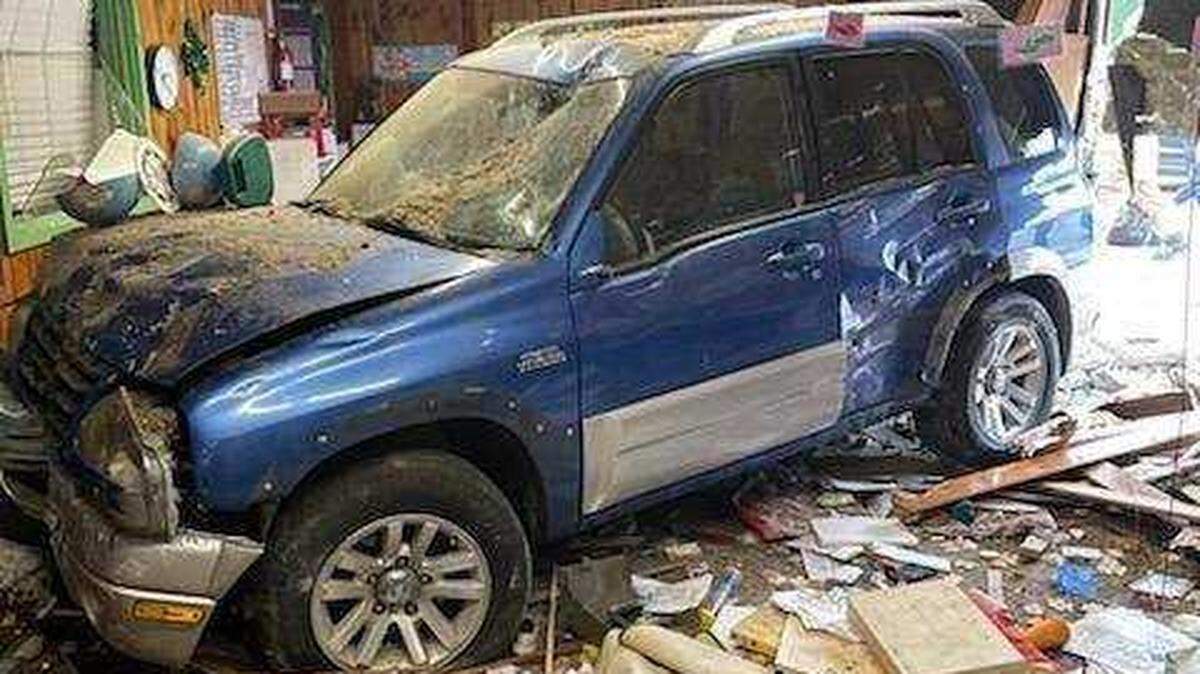 A vehicle is seen inside Great Adventures Christian Preschool and Daycare in Anderson, Calif., on Thursday, March 3, 2022, after it crash into the building with 19 students and two staff members inside. Fourteen children were transported to hospitals ‘for varying level of injures.”