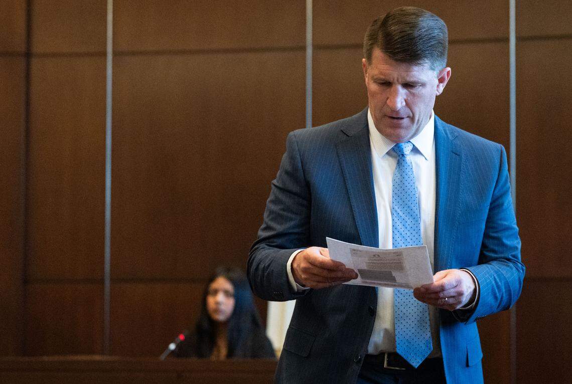 Deputy public defender Daniel Hutchinson walks back to his table after showing Mia Reales Dominguez, 13, an image of a text she sent to Caley Gallardo, the former girlfriend of Mia’s brother Carlos Reales Dominguez, inquiring about her brother’s mental health during her testimony in Yolo Superior Court in Woodland on Monday. Carlos is accused of murdering two and injuring a third in a series of knife attacks in Davis. 