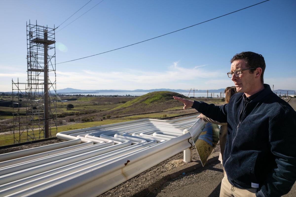 Nik Weinberg-Lynn, Phillips 66 Rodeo renewable energy manager, looks over an area in January that is planned to be a solar field that will provide 15% of the site’s energy requirements as the refinery changes from processing crude oil to renewable fuels.