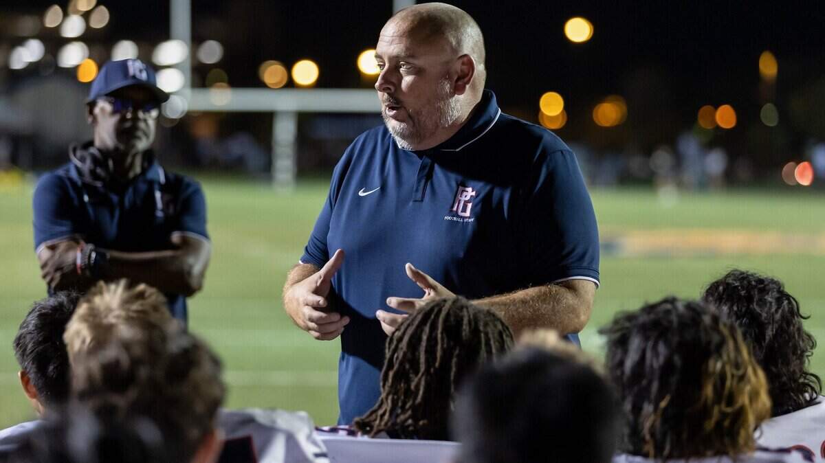 Pleasant Grove coach Josh Crabtree talks with his team after a game in 2022.