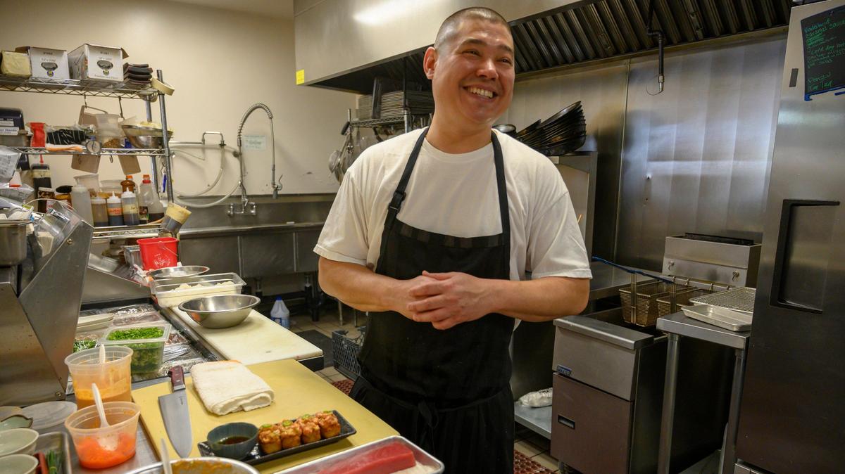 Craig Takehara, chef/owner of Binchoyaki demonstrates how to make krispy rice in his kitchen on Monday, April 8, 2019 in Sacramento.