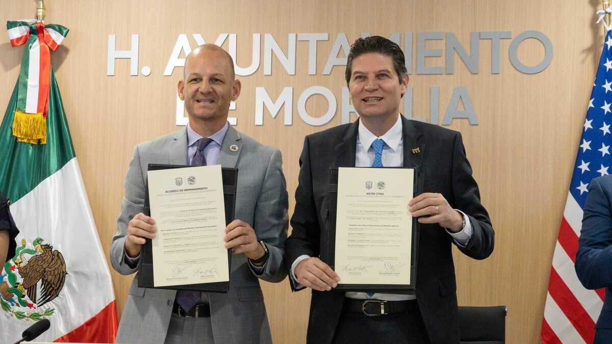 Sacramento Mayor Kevin McCarty, left, and Morelia, Mexico, Mayor Alfonso Martínez Alcázar sign a sister city agreement on Friday, Feb. 6, 2026, at City Hall in Morelia, Michoacán, Mexico. The Sacramento City Council on Thursday formally established the sister city relationship at City Hall, adding Morelia as Sacramento's 12th official sister city to promote tourism, economic development, education, workforce development, cultural exchange and community engagement.