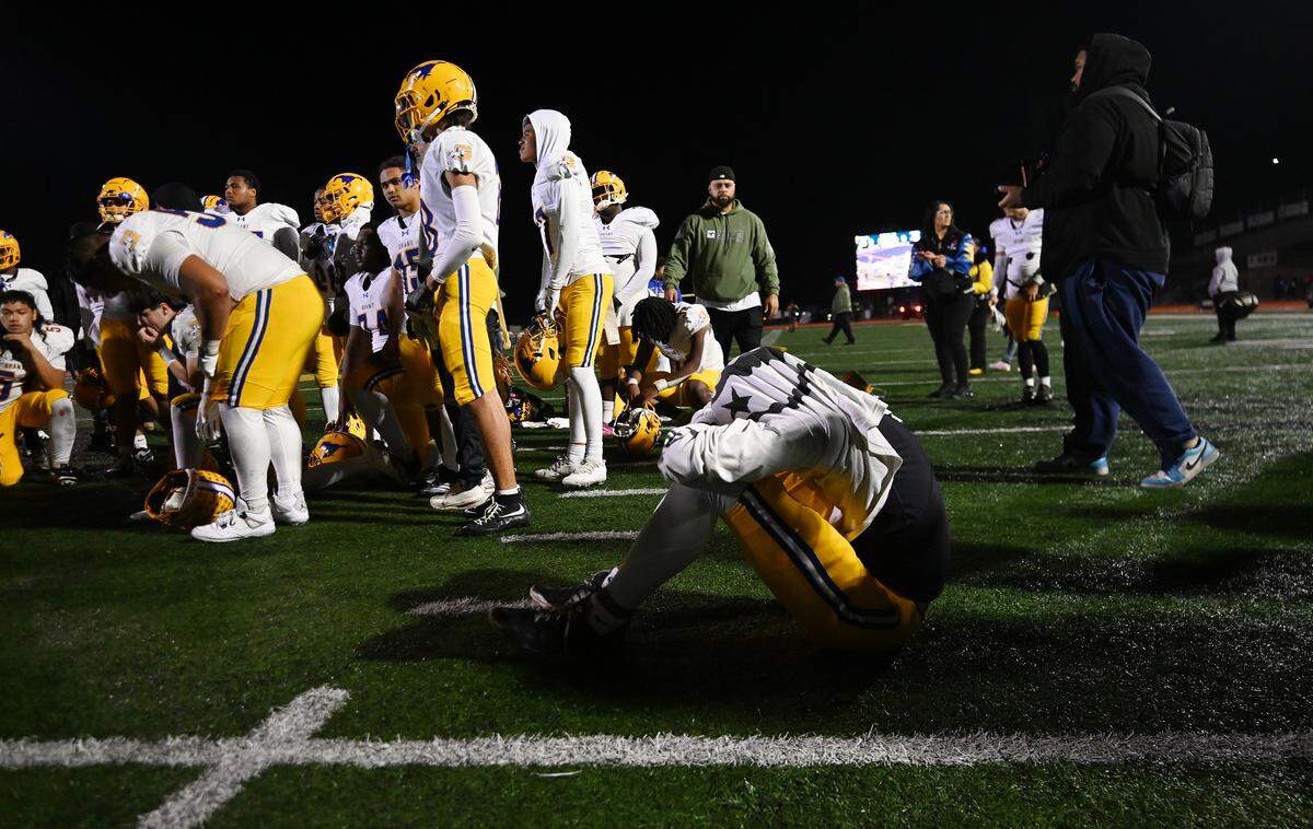 The Grant Pacers express their frustration after losing 9-7 to the Oak Ridge Trojans in the CIF Sac-Joaquin Section Division I semifinal football playoff game in El Dorado Hills on Friday, Nov. 21, 2025.