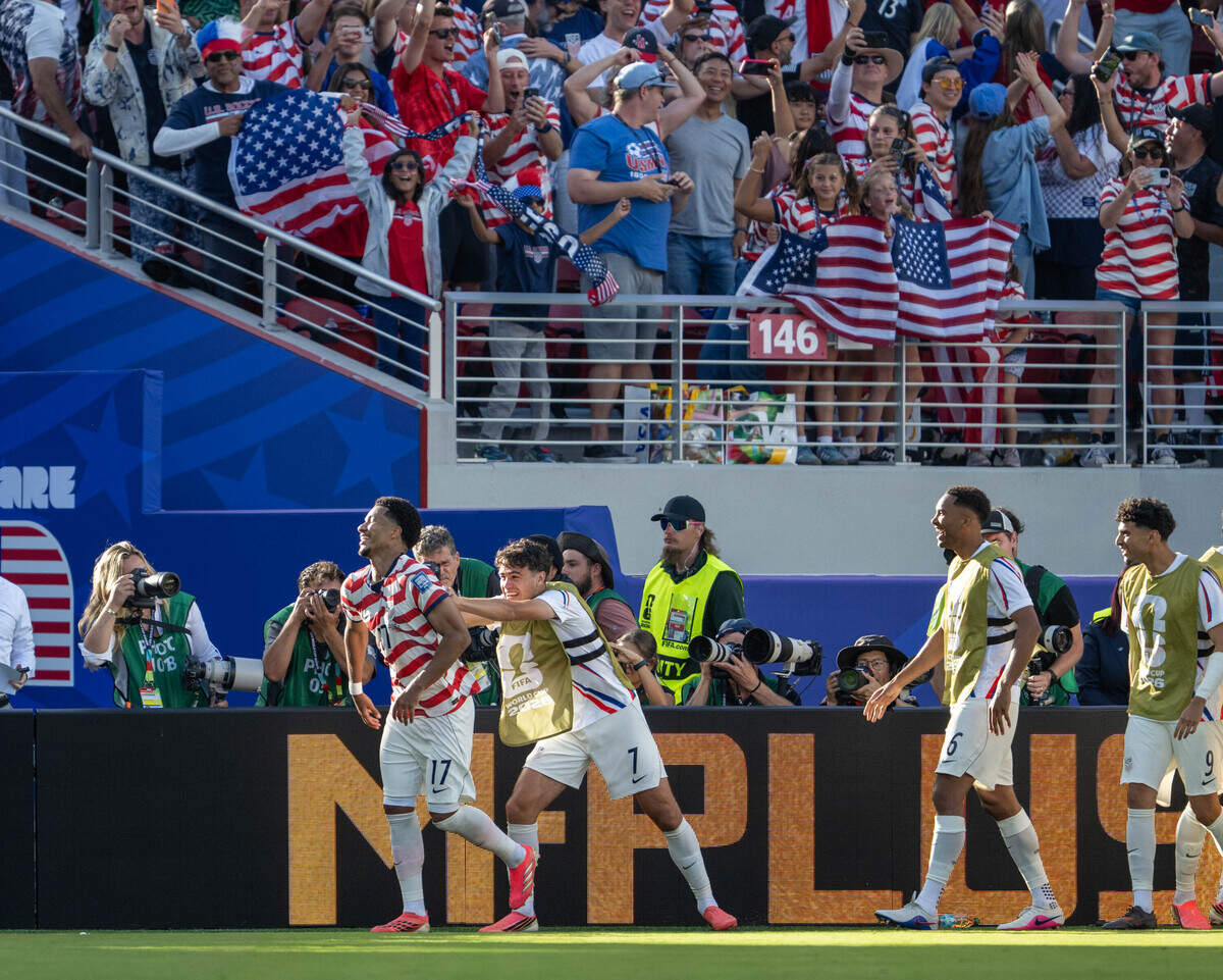 United States midfielder Malik Tillman (17) celebrates after scoring on a free kick as Bosnia and Herzegovina goalkeeper Nikola Vasilj (1) is unable to make the save during the FIFA World Cup 2026 Round of 32 match at Levi's Stadium on Wednesday in Santa Clara.