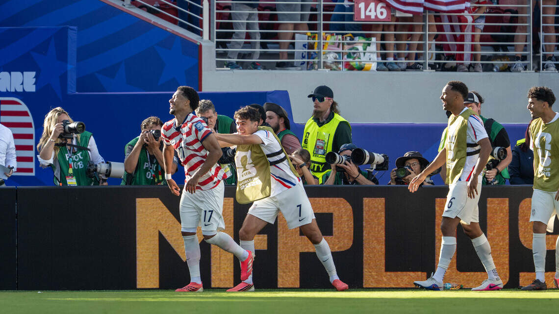 Masterful free kick helps US advance in World Cup after controversial red card