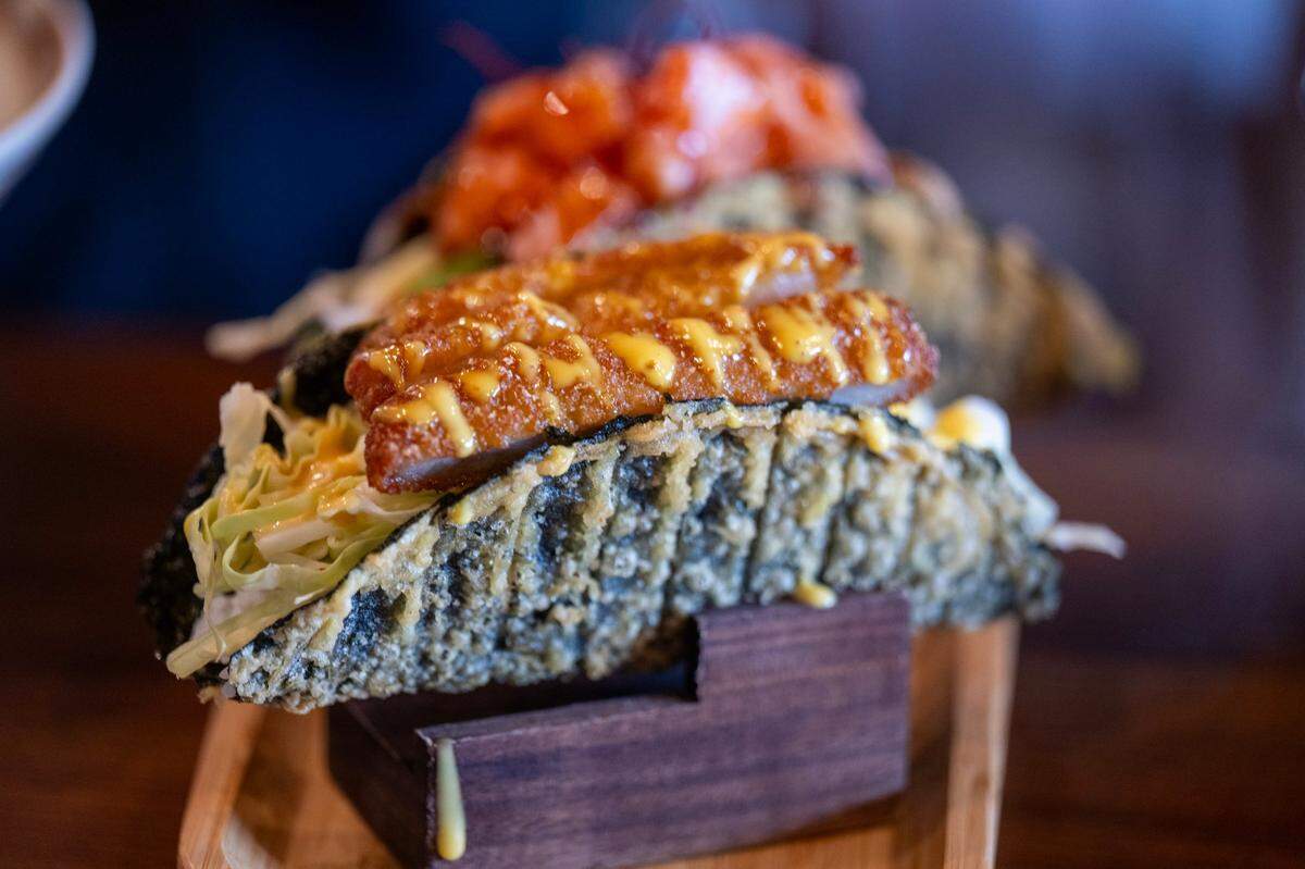 Taco Tonkatsu, $10, includes pork cutlet, cucumber, cabbage, avocado, mustard and honey sauce on a seaweed shell at Engawa Fusion restaurant on Stockton Boulevard in south Sacramento.