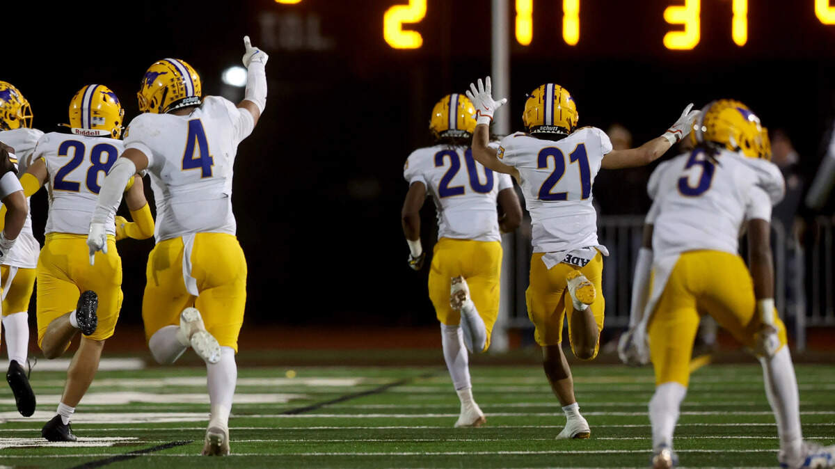 Grant’s Ezekiel Castex (20) returns a Saint Francis turnover for a touchdown in the fourth quarter of the CIF Northern California Division 2-AA championship game Friday in Mountain View.