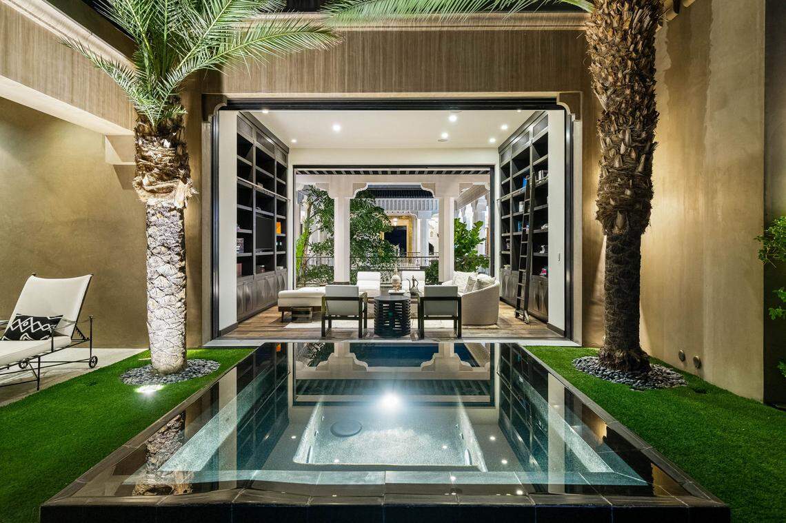 The Palm Desert masterpiece has a dramatic 75-foot lap pool, a Moroccan-inspired circular pool and two spas--one offering breathtaking views of city lights.