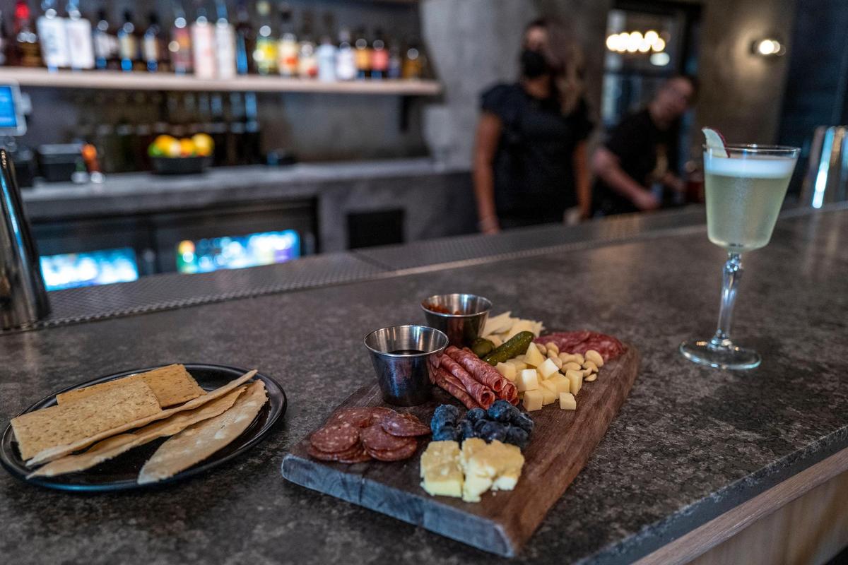 Holy Spirits cocktail bar specializes in rare and allocated spirits along with charcuterie plates.