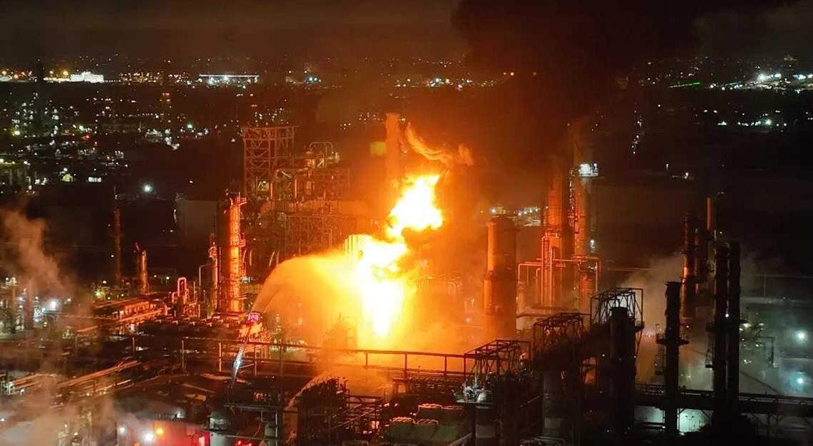 An aerial view of Chevron crews attempting to extinguish a large fire and explosion that occurred at the refinery in El Segundo on Thursday. Experts say Sacramento drivers could see gas prices climb 10 to 20 cents per gallon this weekend after the south state blaze.