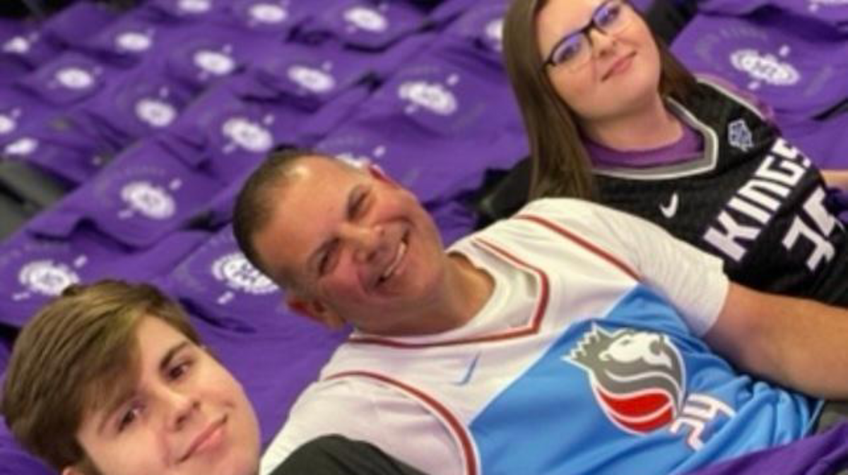 Sacramento Kings fan Gerald Marfil, center, seen here with son Jacob and daughter Kirsten, is recovering after suffering two heart attacks during a family vacation in Cabo San Lucas, Mexico.