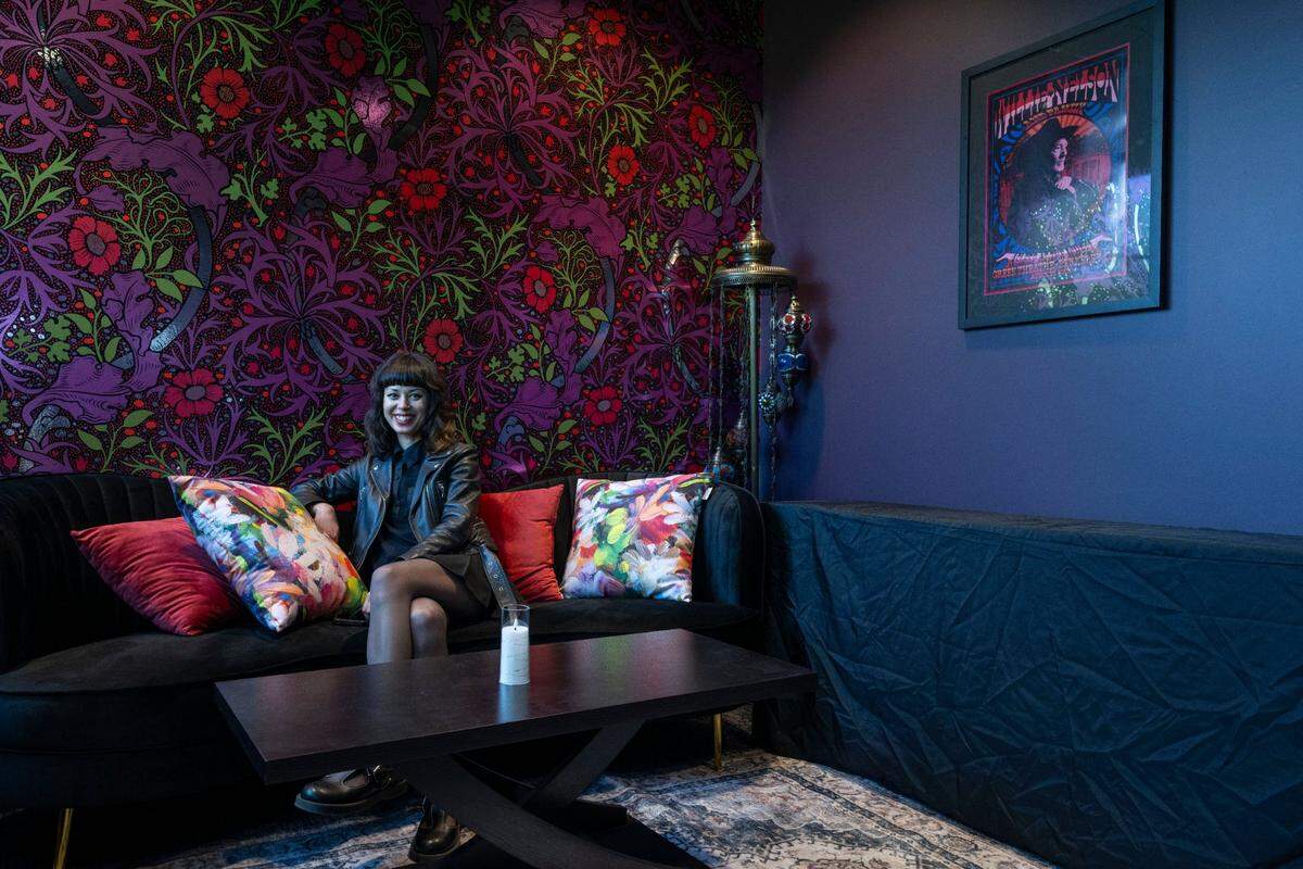 Another Planet Entertainment’s marketing director Liz Liles-Brown sits in one of the dressing rooms during a tour before the grand opening of the Channel 24 music venue in midtown Sacramento on Wednesday. Liles-Brown picked the wall paper that decorates the dressing rooms.