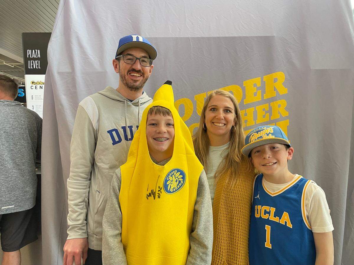 From left: John O’Rourke, Thomas O’Rourke, Leslie O’Rourke, and William O’Rourke pose for a photo after Missouri bested Utah State in the first round of the men’s NCAA basketball tournament on Thursday, March 16, 2023. The O’Rourkes hail from Littleton, Colorado and have never visited Sacramento before. The family has a March Madness tradition of visiting and exploring a new city for the first and second round of the tournament each year.