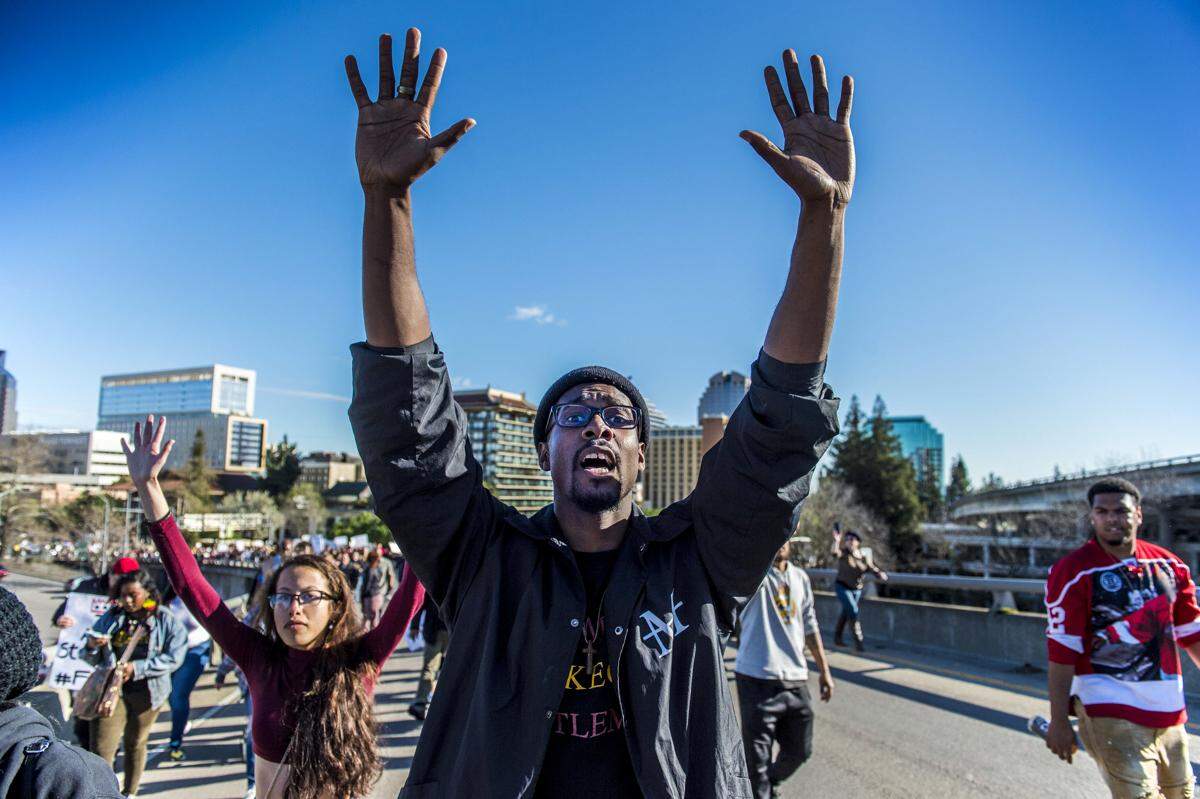 Black Lives Matter supporters walk onto northbound Interstate 5 from I Street on Thursday, March 22, 2018, during a rally for Stephon Clark, a unarmed man that was shot by Sacramento Police.