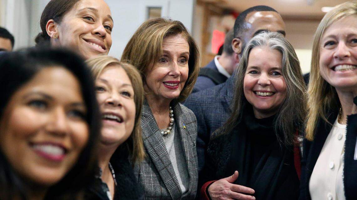 House Speaker Nancy Pelosi (D-CA) stands for photos with attendees at a town hall meeting in the athletic center of College of Mount Saint Vincent in The Bronx on Monday, March 14, 2022. Pelosi Bowman Town Hall Meeting