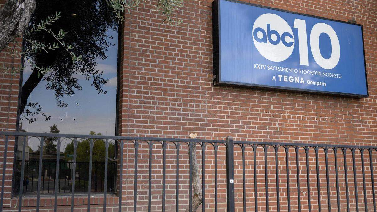 Three shots are visible in a window at the ABC 10 offices in Upper Land Park on Friday in Sacramento. Police are investigating after gunfire struck the station one day after a protest over ABC’s suspension of “Jimmy Kimmel Live!” following remarks about the suspect charged in the murder of conservative activist Charlie Kirk.