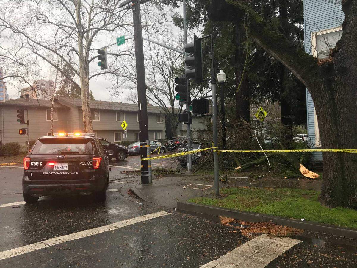 Storm damage is seen Wednesday, Jan. 27, 2021, at 14th and G streets in downtown Sacramento, Calif., after a fierce winter storm barreled across the Sacramento region.