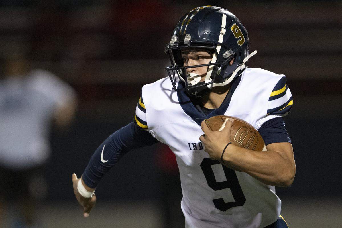 Inderkum Tigers’ Brody Cole (9) runs the ball down the field against Destiny Christian Academy at Destiny Christian Academy in Rosemont on Friday.