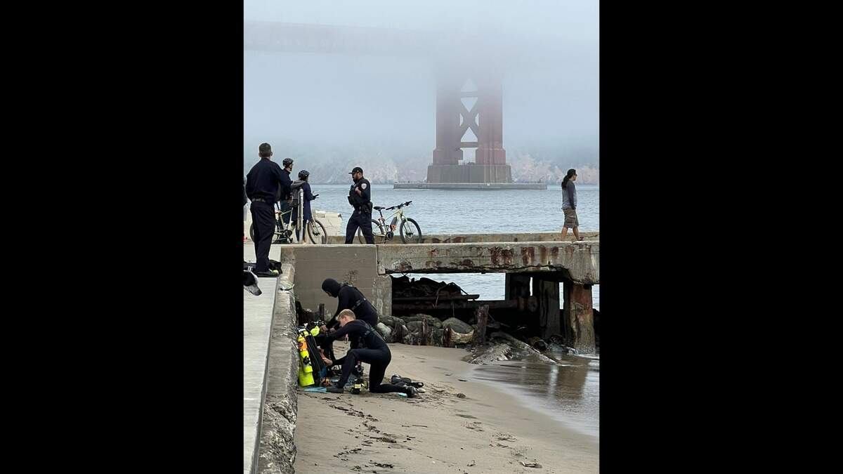 The man tumbled off Torpedo Pier, which sits next to the Golden Gate Bridge, while collecting cans, the fire department said.