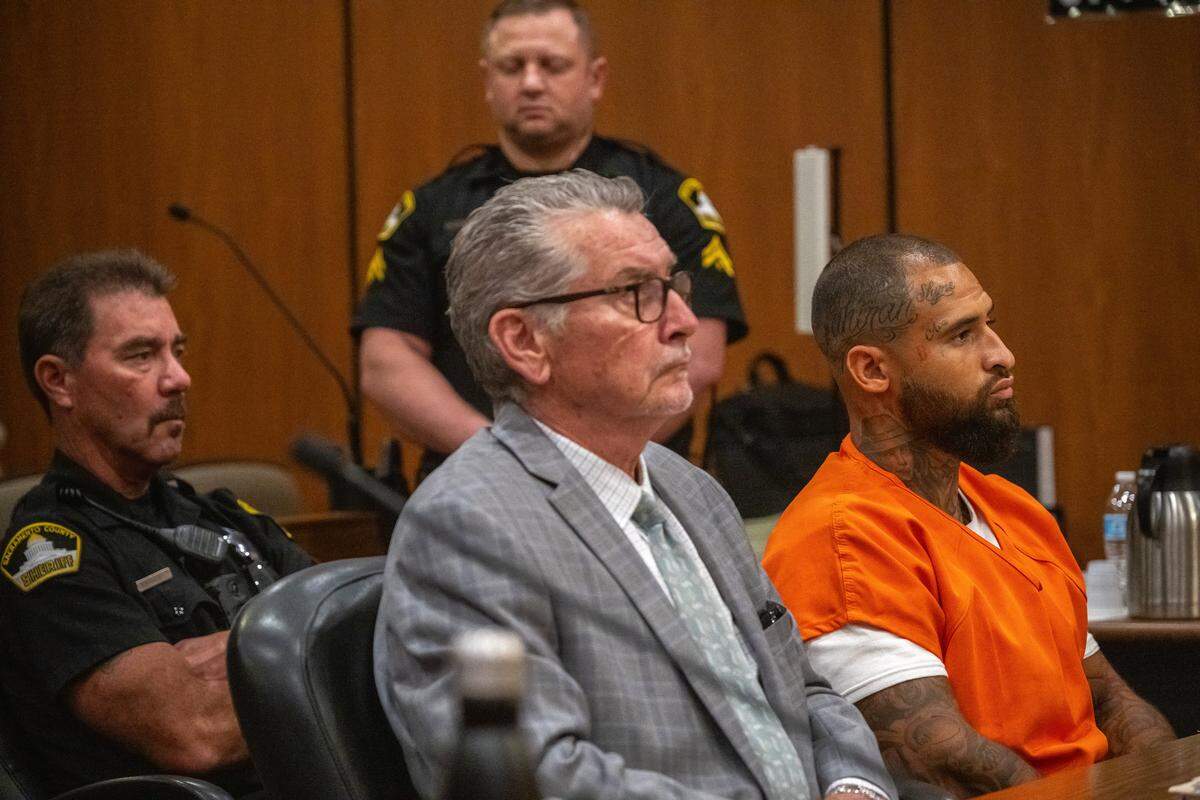 Michael Tahje, right, listens during his sentencing alongside his attorney, Pete Kmeto, at Sacramento Superior Court on Friday. Tahje fatally shot Greg Najee Grimes around 2 a.m. on July 4, 2022, as Grimes was leaving a nightclub near 15th and L streets in Sacramento. Tahje spoke after the victim’s family and friends and apologized for his crime. 