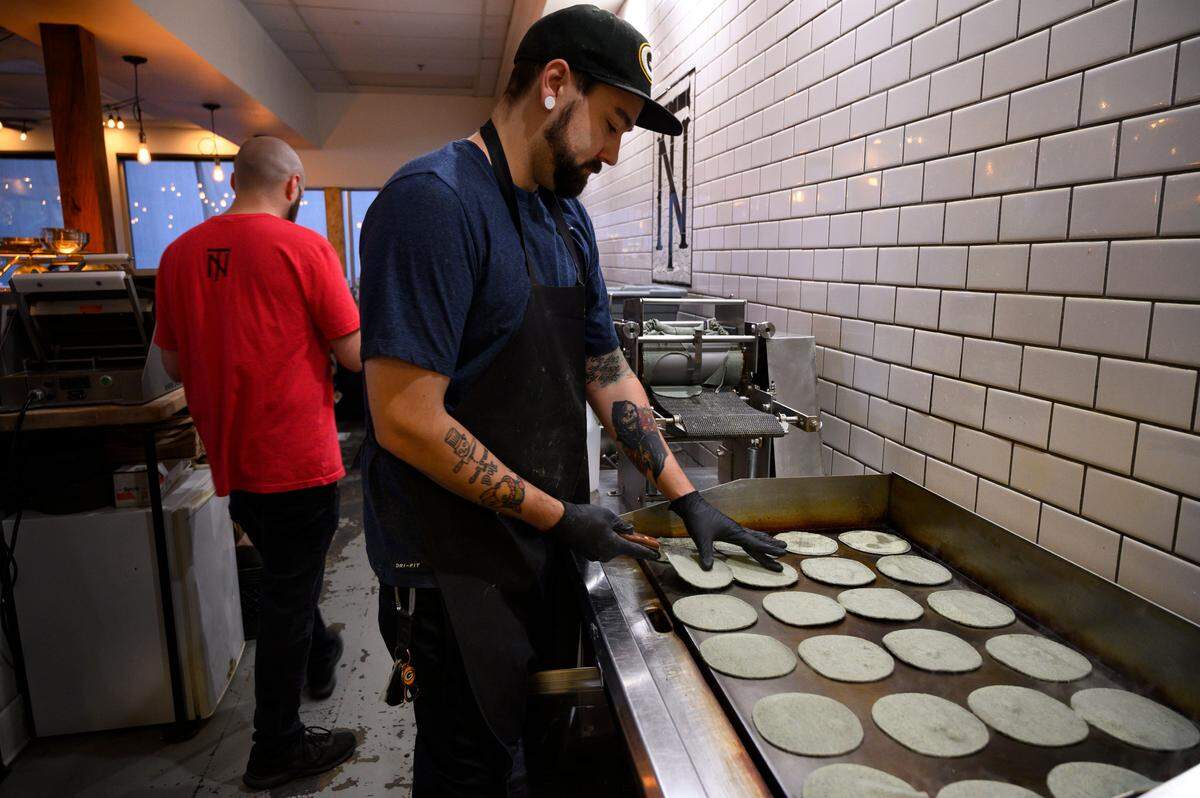 Cook Dustin Miller makes housemade tortillas, Tuesday, July 2, 2019. This week’s “You Gotta Try This” showcases the chicharron taco at Nixtaco in Roseville made with pork belly in a great sauce with lime-pickled onions in a homemade tortilla.