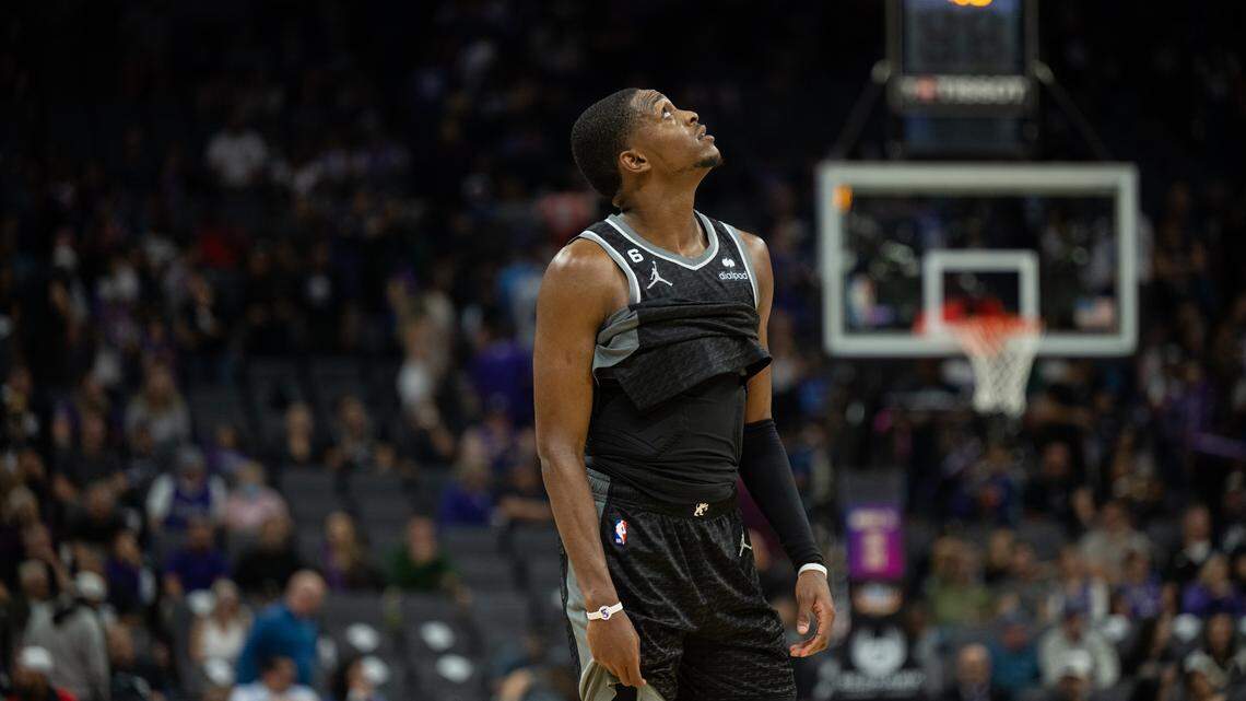 Sacramento Kings guard De’Aaron Fox (5) looks at the scoreboard trailing the Portland Trail Blazers in the final seconds of the game at Golden 1 Center in Sacramento, Wednesday, Oct. 19, 2022.