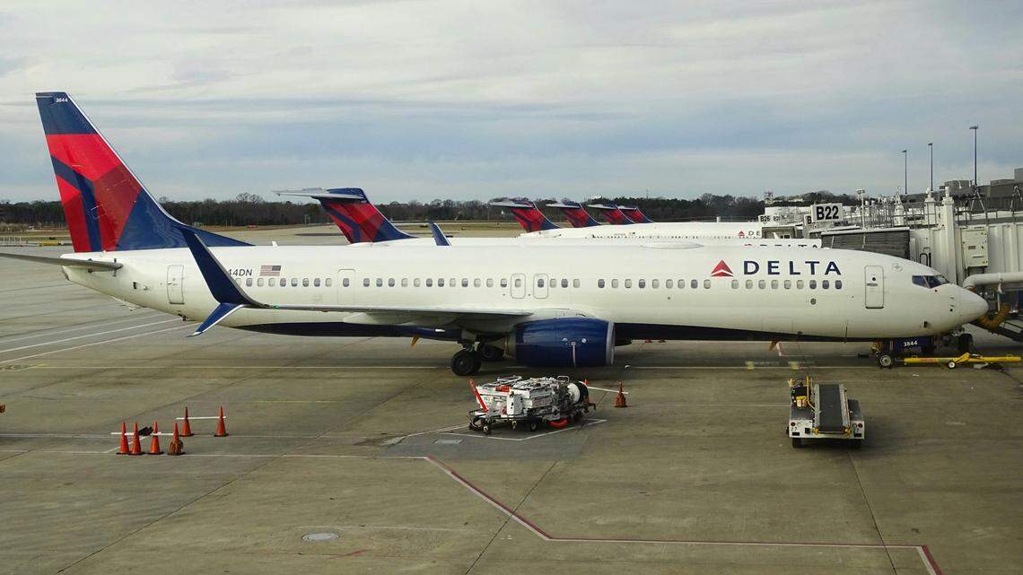 A Texas man without a boarding pass sneaked onto a Delta Air Lines flight and hid in the plane’s bathrooms, feds say.