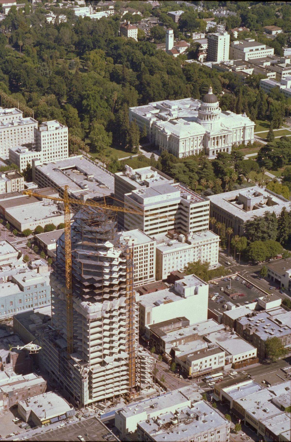 A crane prepares to add the final steel beams to the Renaissance Tower during its construction in 1988. The building would become Sacramento’s tallest building for a time.