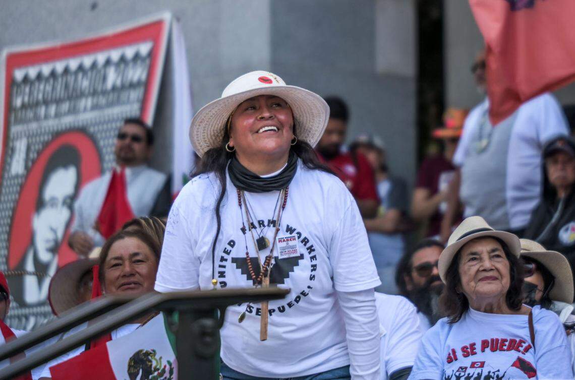 Xochilt Nuñez, of Orosi, is acknowledged at state Capitol for walking 350 miles from Delano to Sacramento with UFW to help pass a unionization bill in California in 2022.