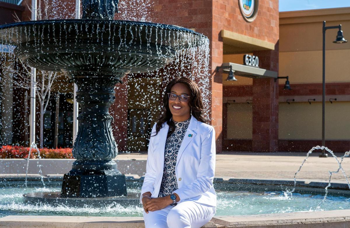 Porsche Middleton sits near a fountain in front of the Citrus Heights City Hall on Thursday, Feb. 4, 2021. Middleton was elected to the Citrus Heights City Council in 2018, representing District 5. She is the only African American woman currently serving on a city council in the Sacramento region.