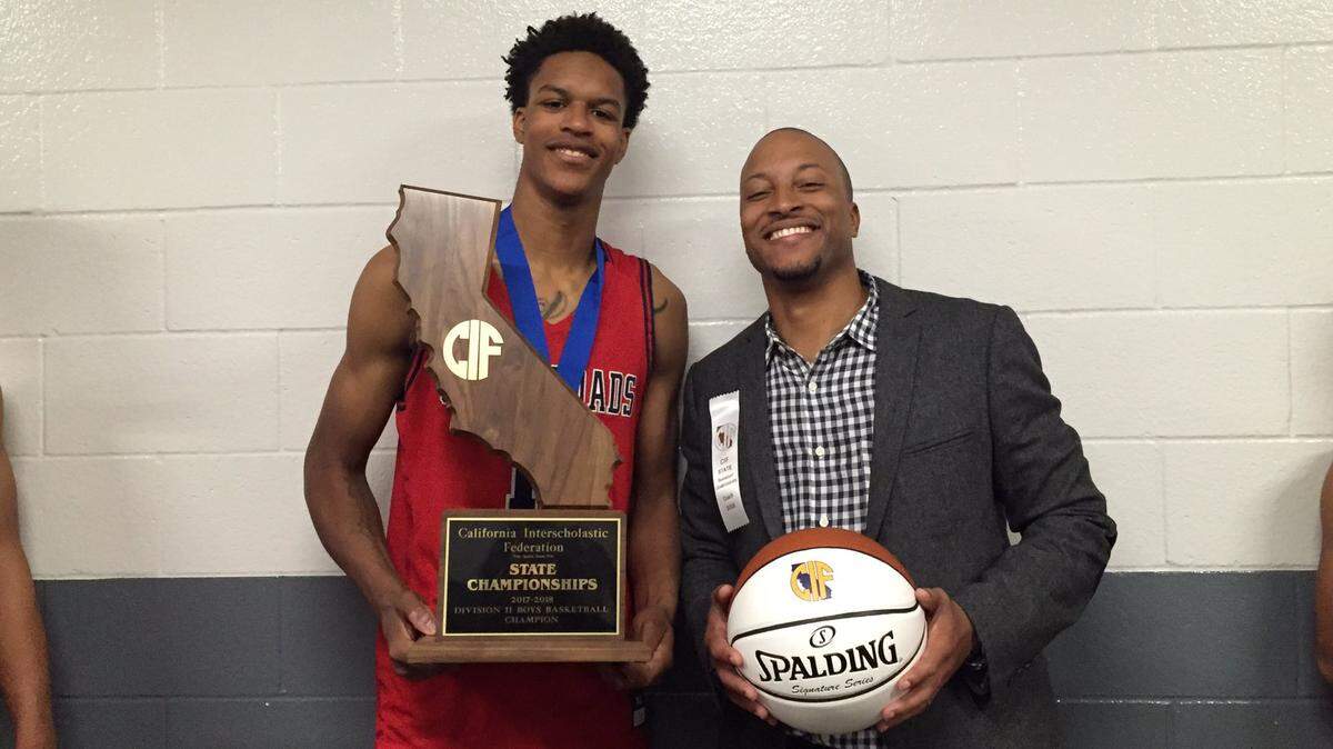 Shareef O'Neal poses with assistant coach Thomas Scott after Crossroads of Santa Monica won the CIF State Division II championship on Friday. Shareef is the son of Shaquille O'Neal, who played on the same Los Angeles Lakers team as Byron Scott, father of Thomas.