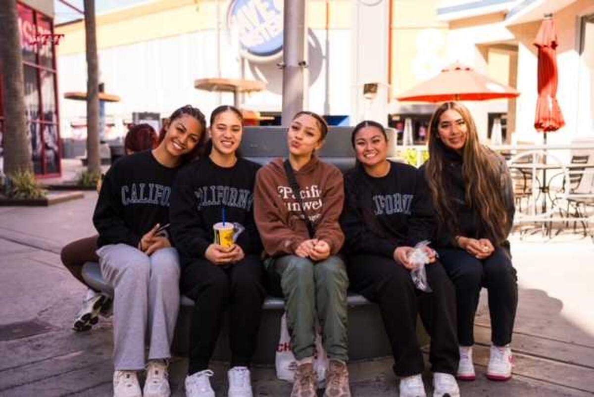 The Lady Eagles during an social outing while traveling away from Sacramento. The Lady Eagles are made up of 15 Sacramento State students and is a team of all athletes of color.