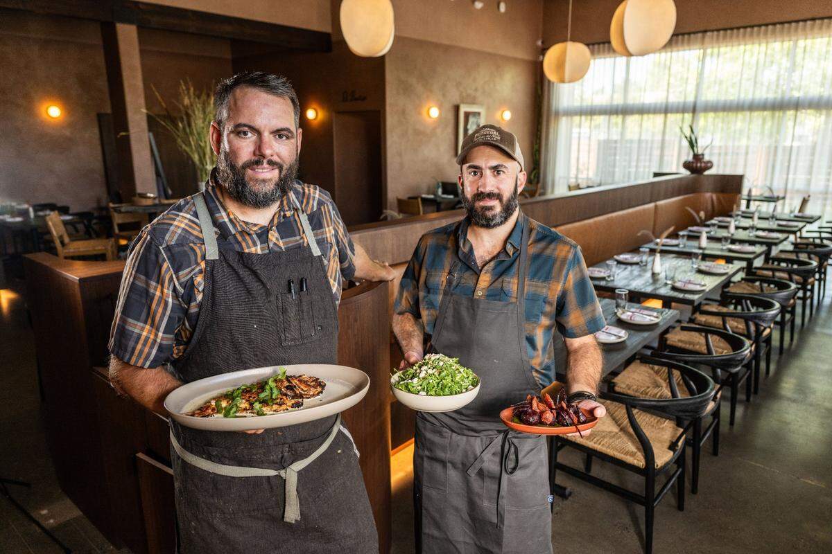 Cantina Pedregal partners, Brad Cecchi and Patricio Wise, show some of the dishes that will be served in their new Folsom restaurant on July 16, 2024.