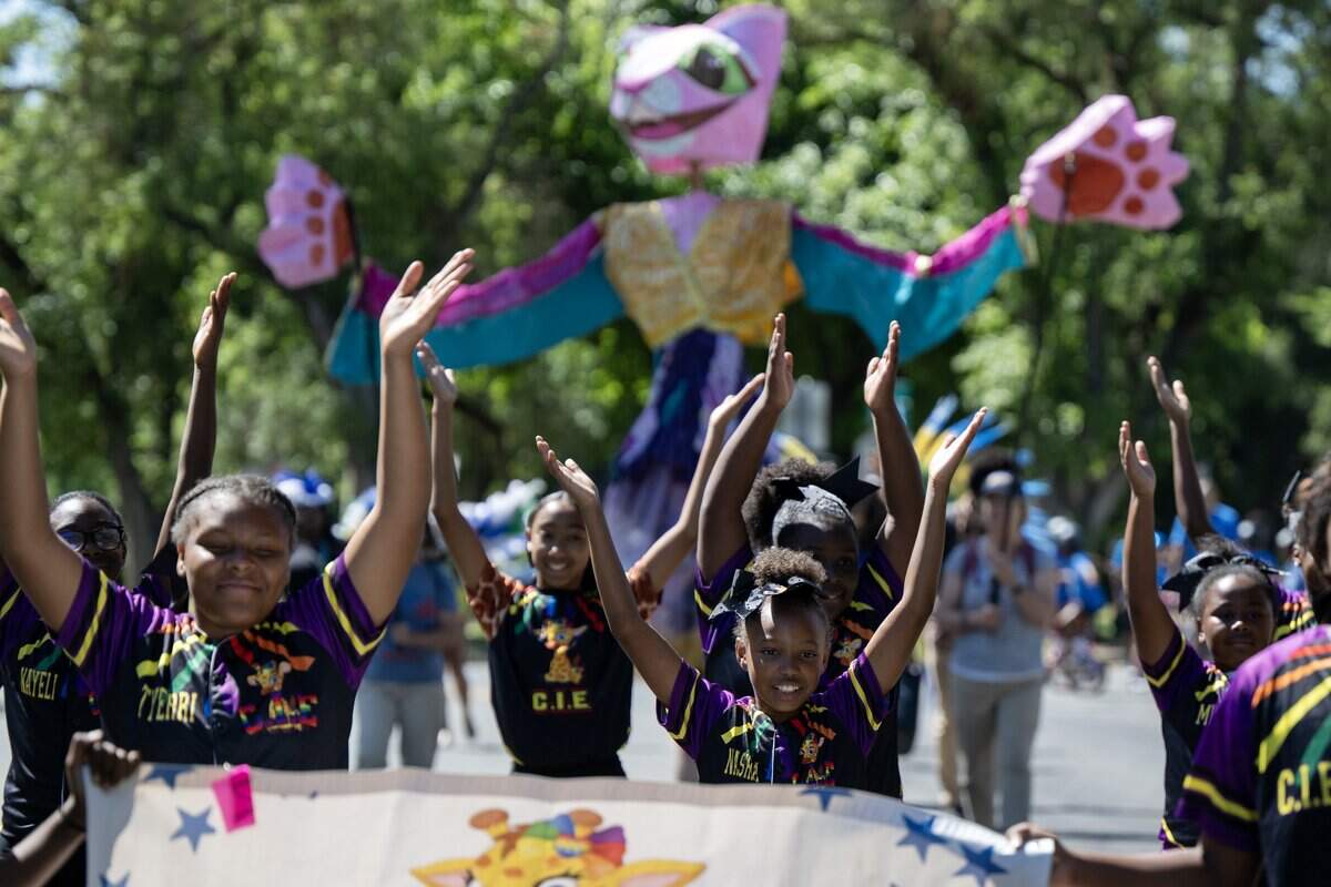 Dancers march during the Juneteenth event in Land Park on Saturday, June 20, 2026, in Sacramento.