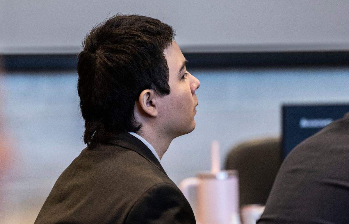 Former UC Davis student Carlos Reales Dominguez listens Monday, May 5, 2025, during the first day of his trial in Yolo County Superior Court in Woodland on murder and attempted murder charges for a series of stabbings in Davis in 2023.