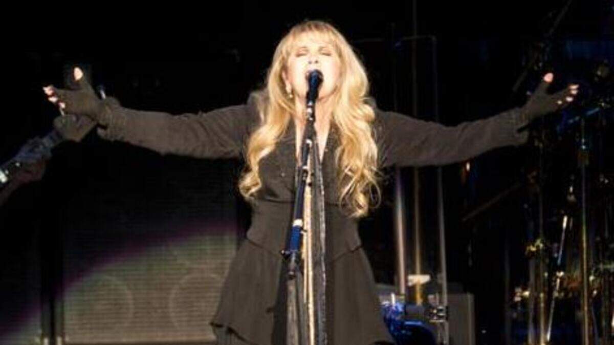 Stevie Nicks, seen in 2014 during a stop in Sacramento, said on Wednesday she is postponing several shows, including stops in San Francisco and Sacramento, due to a COVID-19 illness in her touring band.