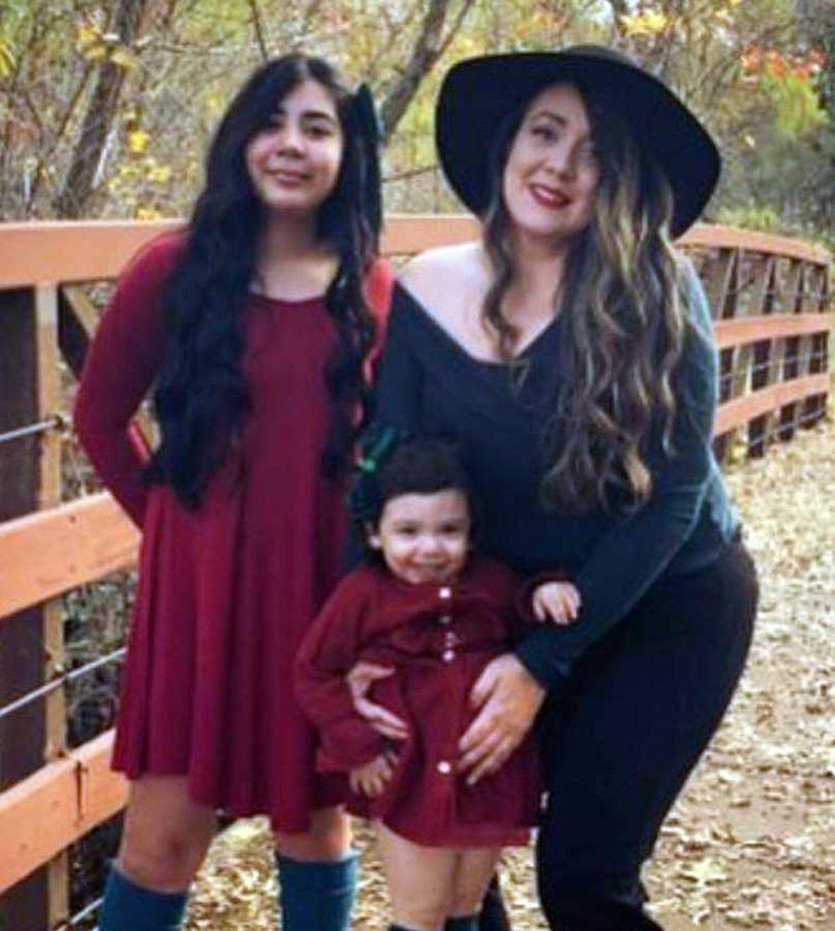 Vanessa Gutierrez and her children are seen in an undated photo. The Sacramento mother is suing the maker of Zinus mattresses after she and her two children — one of them still an infant — were exposed to fiberglass.