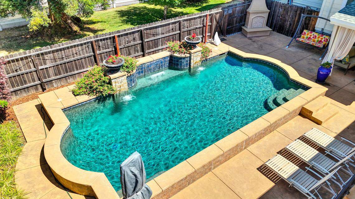 A pool is part of the modern amenities added to the historic residence.