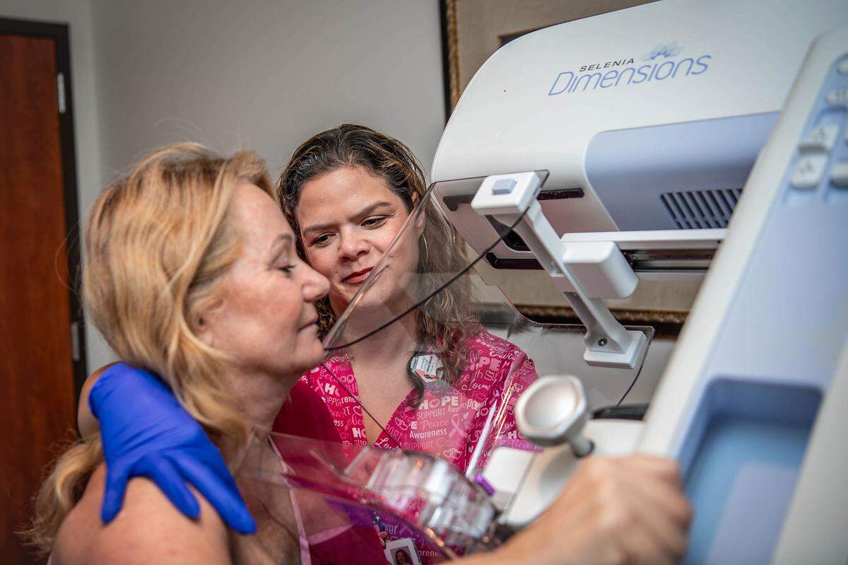 Mammography Technologist, Anne-Marie Murtaugh, assists Patty Roberts during a 3D mammogram screening at Sutter Imaging Sacramento on Nov. 25. Albie Aware Breast Cancer Foundation is asking Book of Dreams readers for funds to help reach out to women for awareness, screenings and support.