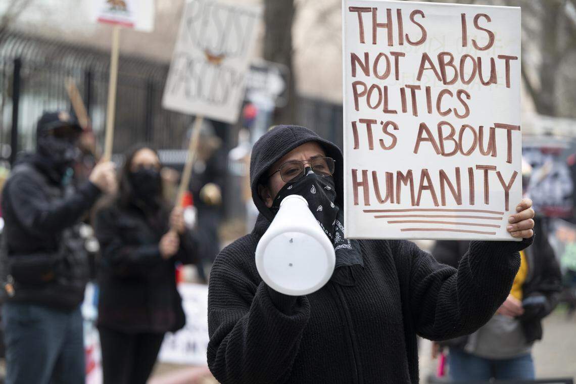 Jo Nava protests against Immigration and Customs Enforcement outside the John Moss Federal Building in Sacramento on Sunday.