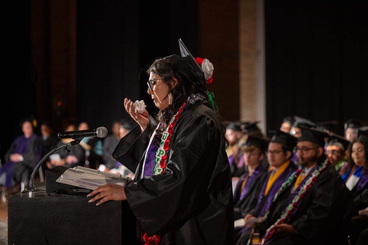 Sacramento New Technology graduate Guadalupe Villagomez breaks down in tears as she thanks her family for their support at the graduation ceremony at Burbank High School on Friday, May 31, 2024.