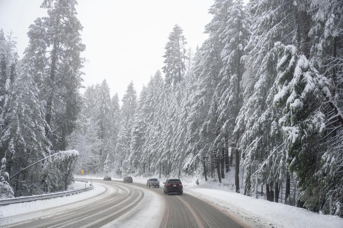 Cars travel along Highway 50 near Pollock Pines on Saturday, March 2, 2024.
