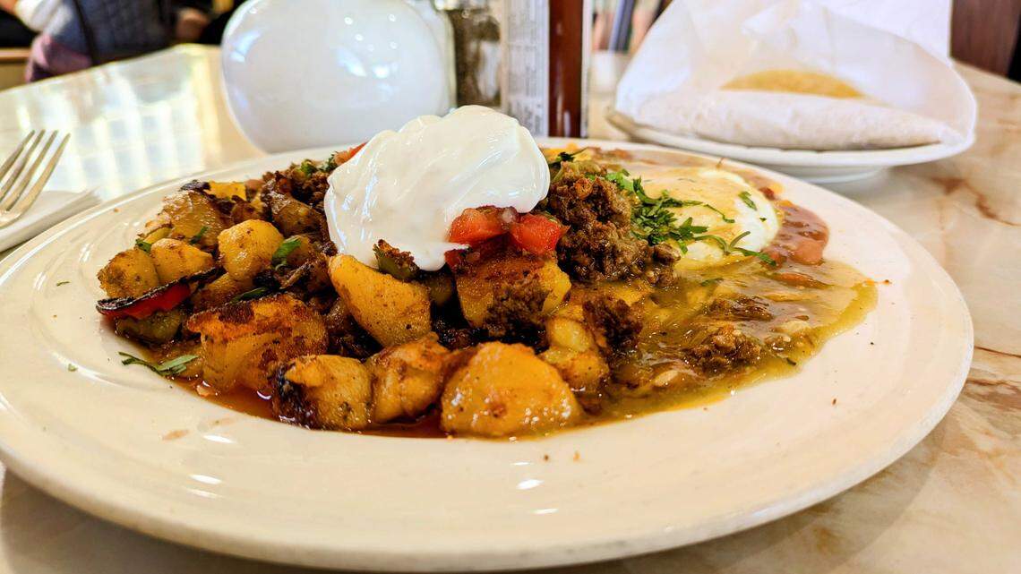Nopalitos’ huevos rancheros with chorizo. East Sacramento locals say the neighborhood institution “feels like home.”