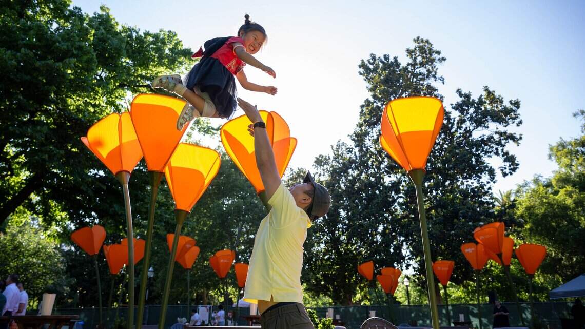Week in photos: Spring bloom + officers remembered + Olympic gold + frog jumping