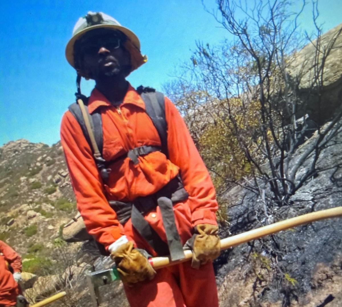 California inmate firefighter Donnell Marin at the scene of the September 2020 Bobcat Fire in the Angeles National Forest. Marin’s wife says changes in how prison officials calculate good time credits that were supposed to create early releases have changed his projected release date from July 2021 to September 2022.