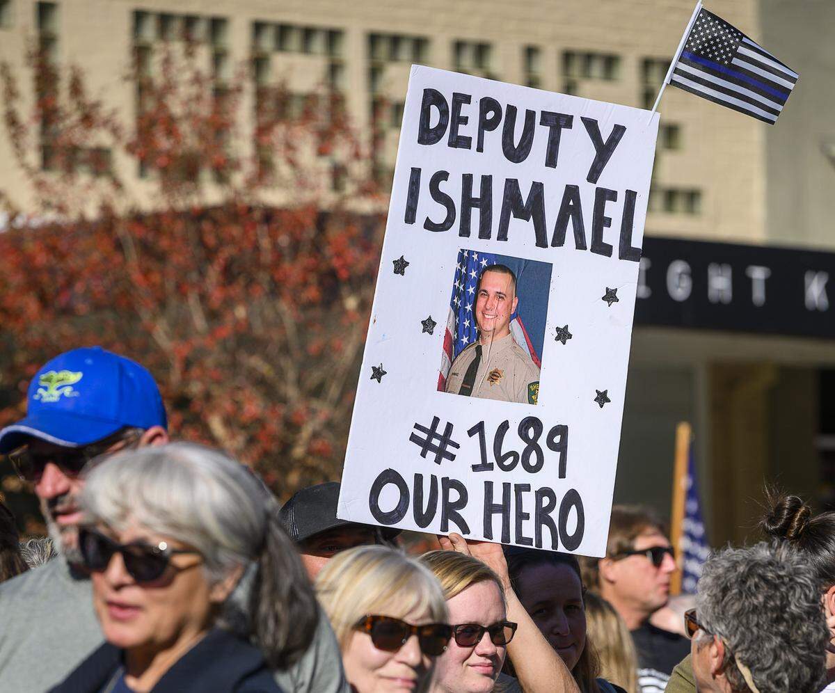Well-wishers come to honor fallen El Dorado County deputy Brian Ishmael during his funeral procession on Tuesday, November 5, 2019, in Placerville.