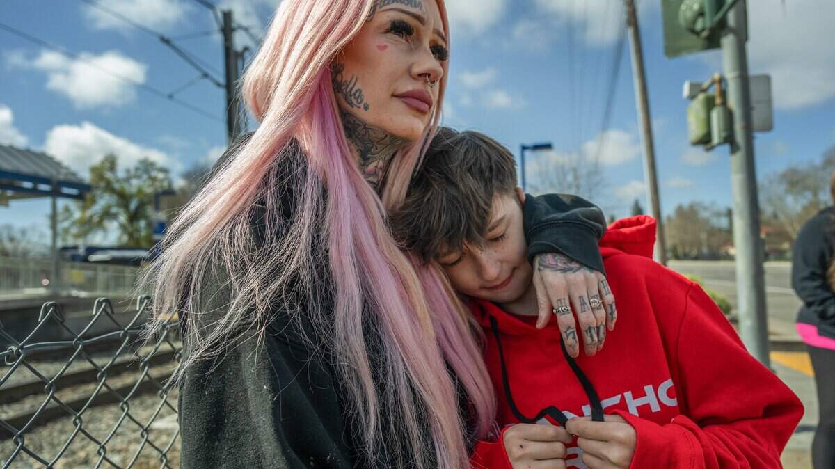 Erika Pringle, 37, gazes toward the intersection of Folsom Boulevard and Manlove Road in Rosemont, where her brother, Andrew Pringle, was fatally struck by a driver in 2023. In an effort to combat increasing pedestrian deaths, the legislature directed a commission to study the dangers of heavier vehicles.