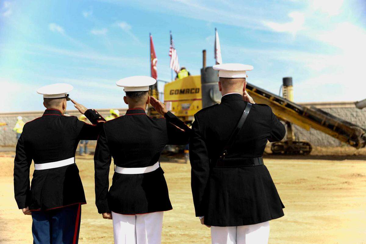 Marines with Recruiting Station Sacramento visit the construction site June 15 for a road paving in remembrance of Sgt. Nicole Gee in Roseville. Gee and 12 other American service members were killed in an August 2021, attack in Kabul, Afghanistan.